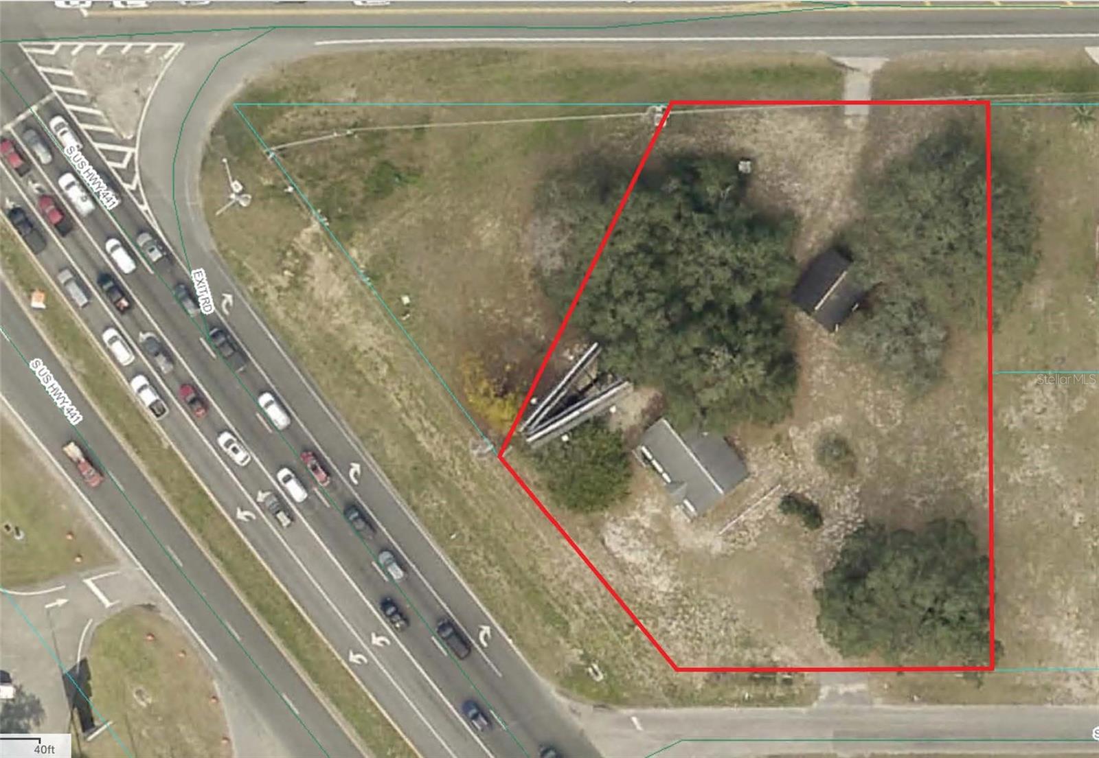 High traffic count corner in Marion county, but close to the Villages, also includes a billboard with income. Sellers are ready to deal!