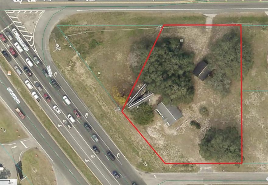 High traffic count corner in Marion county, but close to the Villages, also includes a billboard with income. Sellers are ready to deal!