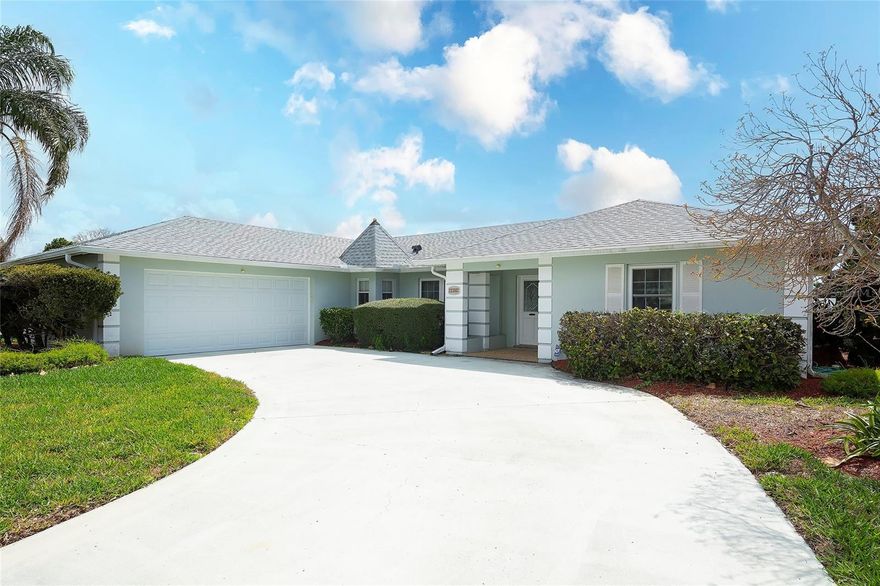 Welcome to this well-maintained 3-bedroom, 2-bath home nestled on a quiet street in the desirable Village Green neighborhood—perfectly located just a short drive from the area’s stunning Gulf beaches, Tampa and Sarasota airports, shopping, dining, hospitals, and everyday conveniences. This home provides the ease of single-level living with a new roof, Seller owned solar panels as well as a security system. A spacious floor plan and a desirable split-bedroom layout provide added privacy for family and guests. The heart of the home is the beautifully renovated kitchen, designed for both function and style. It features an abundance of wood cabinetry with plenty of storage, granite countertops, and generous workspace—perfect for the home chef. Guests can relax in the family room or gather at the convenient breakfast bar, making entertainment effortless. The interior also features new carpeting in the living room offering warmth and comfort. The primary suite includes a private bath with a walk-in shower and two closets, while the guest bedrooms have large closets and share a well-appointed bath with a tub. Enjoy additional living space in the light-filled Florida room, ideal for relaxing, working from home, a  playroom or entertaining. Step outside to a backyard, perfect for pets, gardening, or simply unwinding in your private outdoor space. Plenty of room for a pool to be added. Other features include 2-car garage with storage,  a hurricane-rated garage door, and is located in an X flood zone which offers added security and lower insurance costs. Village Green is a popular neighborhood with a voluntary HOA, known for its welcoming atmosphere and convenient location. Outdoor lovers will appreciate being close to Robinson Preserve, featuring scenic hiking and biking trails, running paths, kayaking areas, and a perfect place for family picnics..