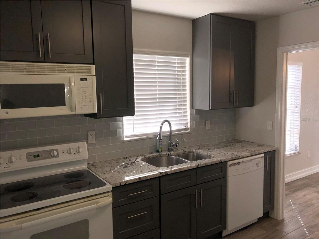 Photo of 21322 Stillwater Avenue, Port Charlotte, FL 33952 (MLS # C7521991)