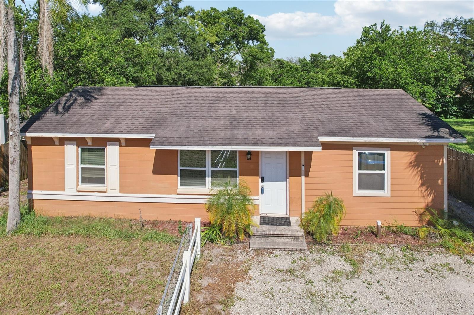 Endless potential in a prime Tampa location! This 3-bedroom, 2-bathroom home with no HOA sits on a great lot and offers a flexible layout perfect for creating a 2/1 and 1/1 split / ADU.
The living room flows into the kitchen with a breakfast bar, while two generous bedrooms share a full bath on one side of the home. On the other, you’ll find a separate bedroom and full bath with its own private exit to the yard—making it easy to convert into a private 1/1 ADU with just a door or simple partition.
Outside, enjoy a patio and a large fenced yard with plenty of space to gather or unwind. With a newer HVAC (2022) and unbeatable location—less than 20 minutes to Tampa International Airport and the beaches, and close to USF, shopping, dining, and more—this property is a rare find that checks all the boxes for both living and investment. Mortgage savings may be available for buyers of this listing.