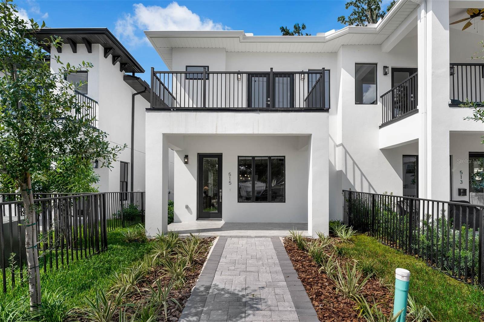 We’re excited to introduce a newly completed larger floor plan townhome in this highly sought-after community. Thoughtfully designed with designer-selected finishes and unique color palettes, this move-in ready residence combines modern style with everyday comfort.
Inside, you’ll find 3 spacious bedrooms, 2 ½ baths, and an open-concept layout ideal for both entertaining and daily living. The bright and airy first floor features a generous great room with wood-look tile, a dedicated dining area, and a chef-inspired kitchen complete with quartz countertops, a dramatic waterfall island, and premium appliances including an electric cooktop and wall oven/microwave combo.
Upstairs, the Primary Suite is filled with natural light and offers a private balcony overlooking College Park. The spa-like bath boasts a double vanity and sleek Delta finishes, while two additional bedrooms share a stylish full bath with modern matte black fixtures. For added convenience, the laundry is located on the same level as the bedrooms.
Each home includes a two-car garage with private rear entry, direct access into the kitchen, and a 220 outlet for EV charging. Right next door, you’ll enjoy a community park with workout equipment and a dog walking area.
With low-maintenance living and an unbeatable location—walkable to The Drive’s shops and dining, just 10 minutes to Downtown Orlando, 15 minutes to Park Ave, and 10 minutes to Advent Health on Rollins—this townhome perfectly blends style, comfort, and convenience.
All room dimensions are sourced from builder plans, buyer or buyers agent is responsible to verify.