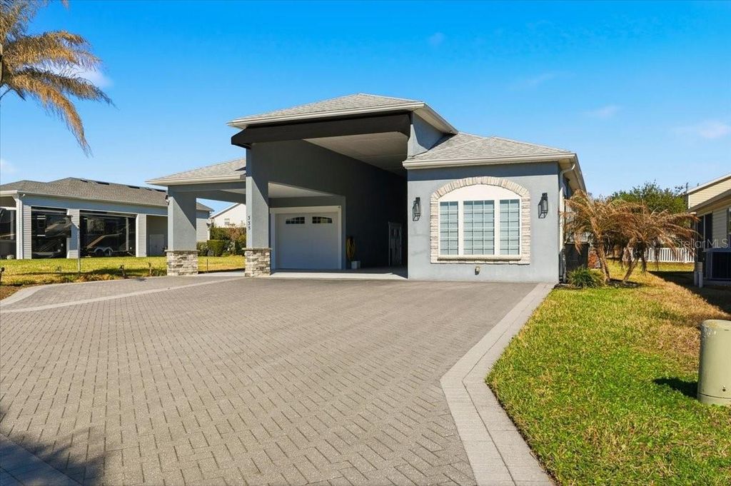 Photo of 335 Travelers Drive, Polk City, FL 33868 (MLS # L4959505)