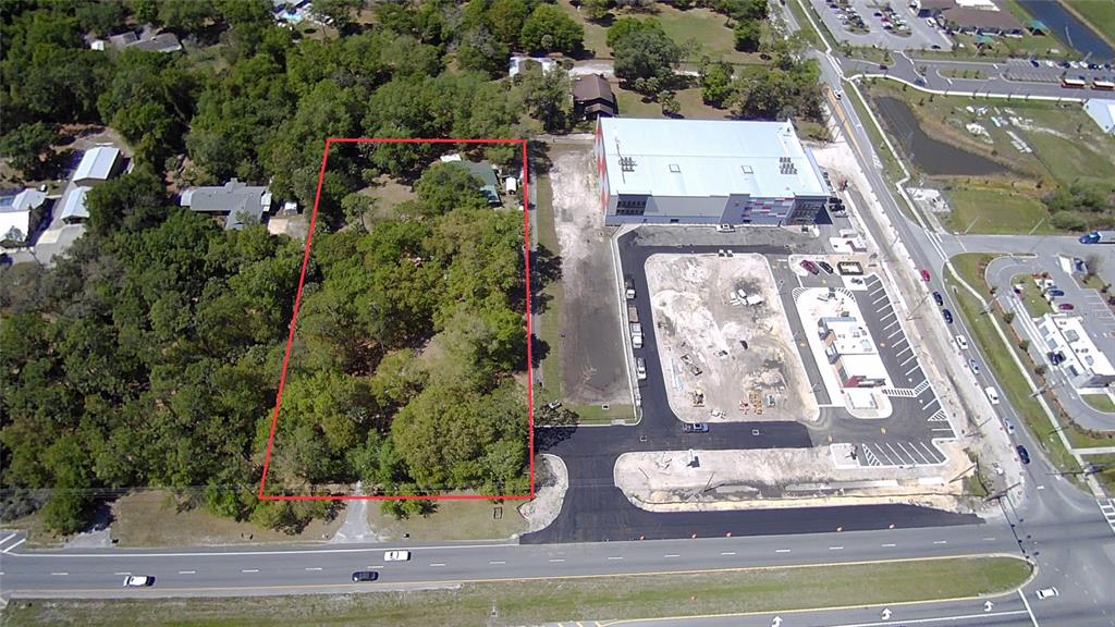 Exceptional development opportunity in one of Kissimmee’s fastest-growing corridors! This 2-acre parcel at 3340 Pleasant Hill Road, Kissimmee, FL, boasts high visibility and premier frontage along Pleasant Hill Road, directly across from the new Valencia College campus and just north of the established Bellalago community. With over 45,000 AADT, this site ensures maximum exposure for future development. Situated directly across from the new Valencia College campus and just north of the established Bellalago community, this property is surrounded by thriving commercial and residential development. The adjacent parcel has already been developed with a self-storage facility and fast-food restaurant, reinforcing the area's strong demand for retail and service-oriented businesses. This is a rare opportunity to develop a high-profile site in a thriving commercial corridor with built-in demand.