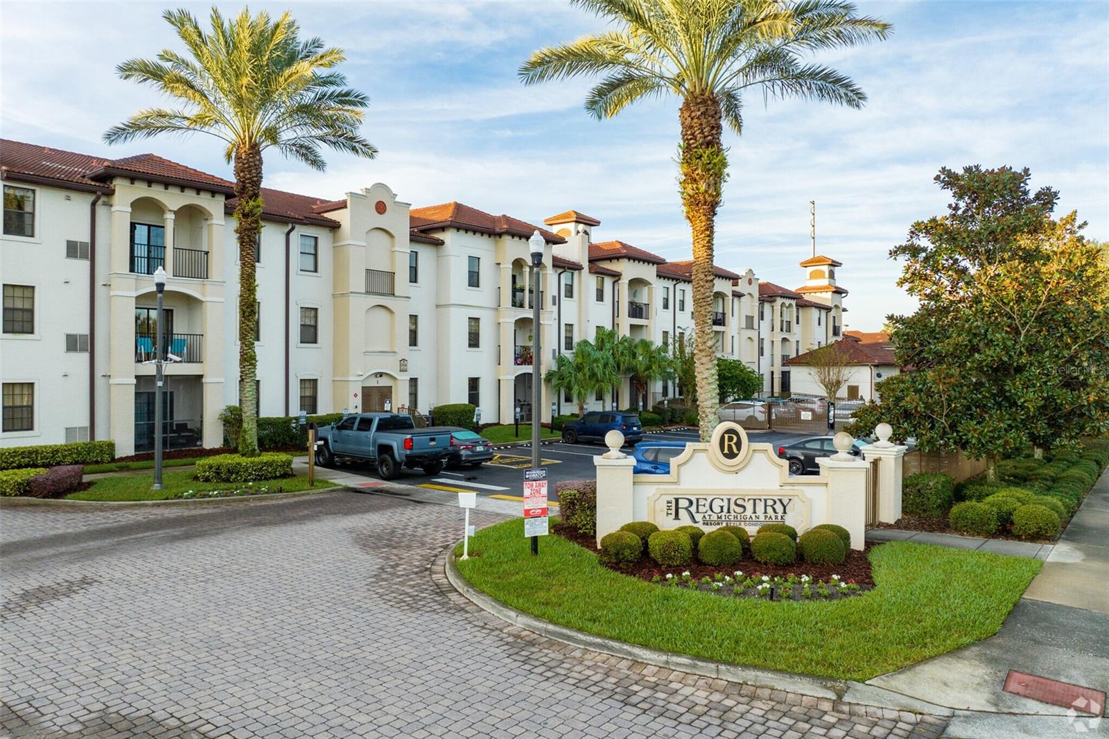 The Registry at Michigan Park Condominium offers resort style living, live in convenient luxury at this maintenance free gated community. Unit is 2 bed 1 bath with brand new AC system. Amenities include 2 sparkling heated pools with spacious sun decks, clubhouse with billiards, bar, television and entertainment area, as well as community fitness center. On site property management oversees building security. Very convenient to shopping, bus line, East West Express Way, attractions and Orlando International Airport. Only minutes from downtown Orlando. Internet, Cable TV, Ground Maintenance, Pest Control, Water, Sewer & Trash are all included with the HOA.