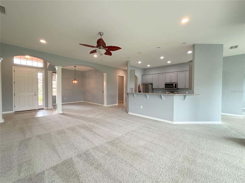 Photo of 1124 Sawgrass Drive, Winter Haven, FL 33884 (MLS # P4939422)