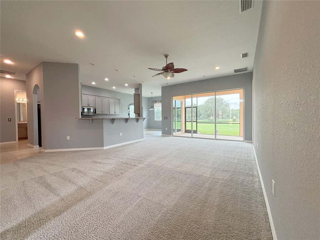Photo of 1124 Sawgrass Drive, Winter Haven, FL 33884 (MLS # P4939422)