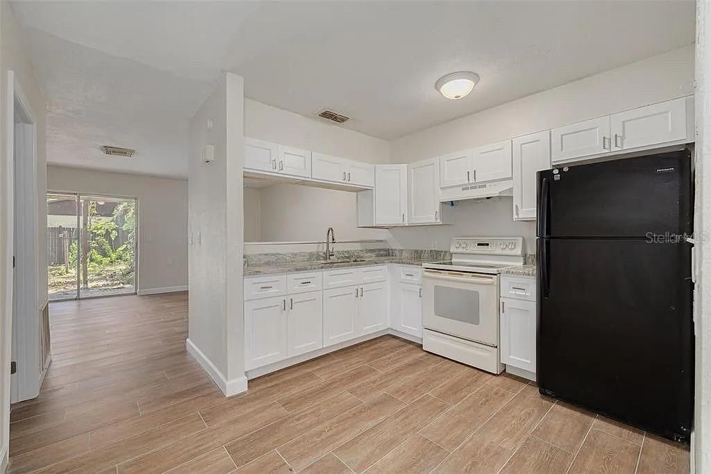 Photo of 7116 Oakwood Drive, New Port Richey, FL 34652 (MLS # TB8453350)