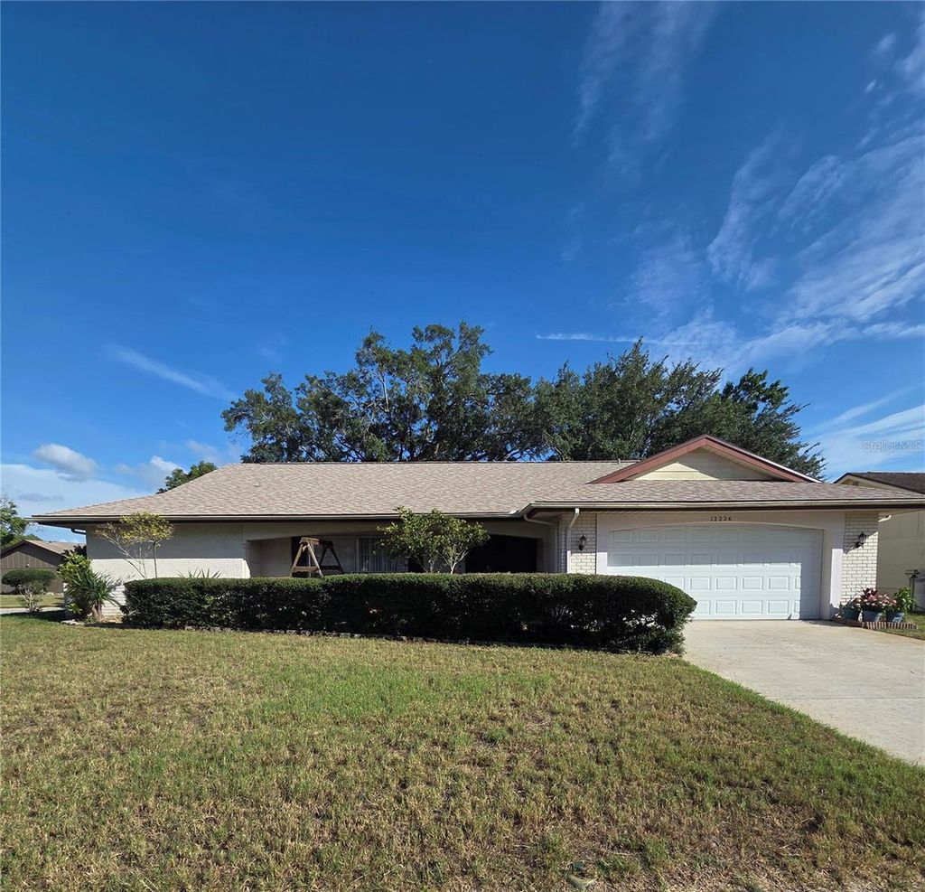 Photo of 12226 Meadowbrook Lane, Hudson, FL 34667 (MLS # TB8517837)