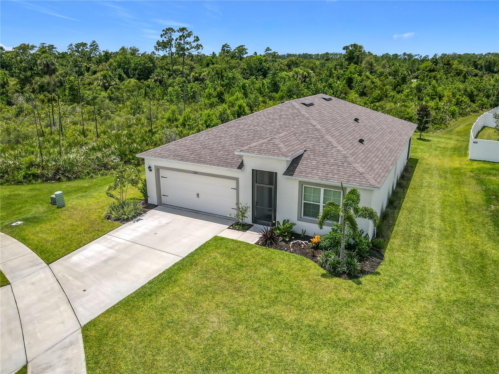 Tucked away. Ready for your Florida lifestyle.
Welcome to this 2024-built, concrete block home perfectly positioned on a quiet cul-de-sac in Coastal Woods—one of New Smyrna Beach’s most convenient and fast-growing communities. With 4 bedrooms, 2 bathrooms, and .26 acres of space, you’ll enjoy the freedom of modern living in a peaceful setting with room to spread out. Take advantage of the community pool, pickleball courts and playground.
Cruise to the beach in minutes, or explore the nearby trails, golf courses, and historic downtown just down the road. The open-concept layout, smart design, and energy-efficient features make everyday life effortless—whether you’re entertaining or unwinding.
Unlike the others currently available, this home offers extra privacy, a larger lot, and a cul-de-sac location—ideal for families, snowbirds, or anyone craving a calm, coastal lifestyle.