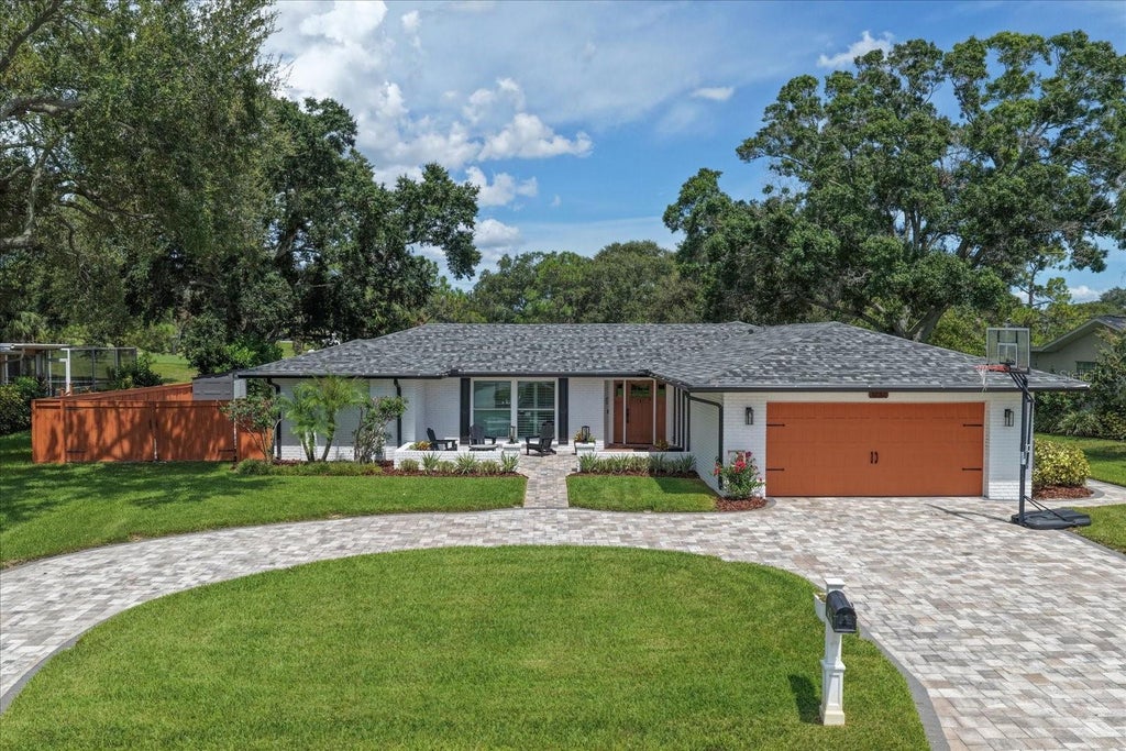 Photo of 1232 Saint Andrews Drive, Dunedin, FL 34698 (MLS # TB8549649)
