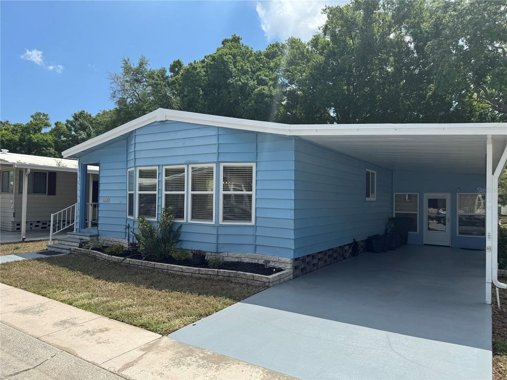 Photo of 1001 Starkey Road #310, Largo, FL 33771 (MLS # TB8491856)