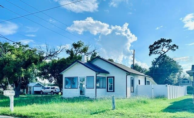 Photo of 624 Illinois Avenue, Saint Cloud, FL 34769 (MLS # O6429090)