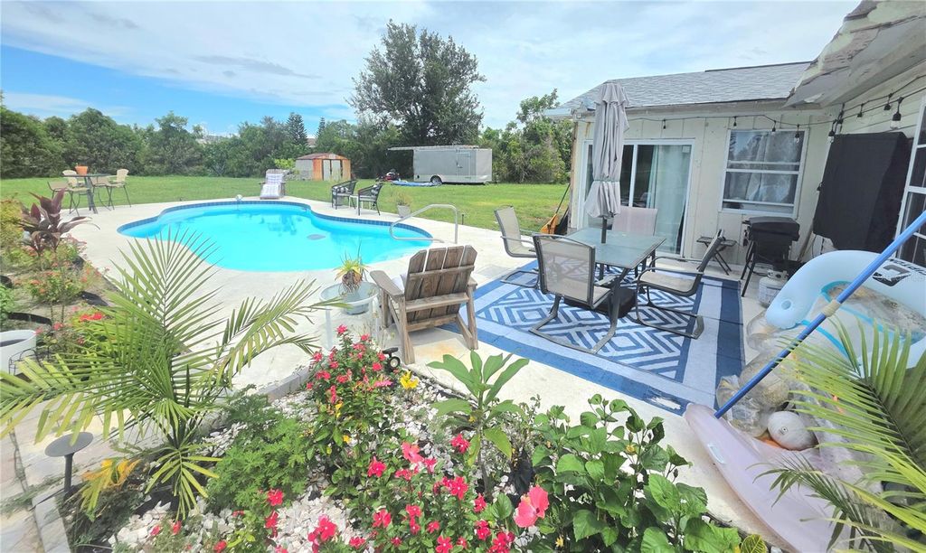 Photo of 5950 Spearman Circle, North Port, FL 34287 (MLS # C7514547)