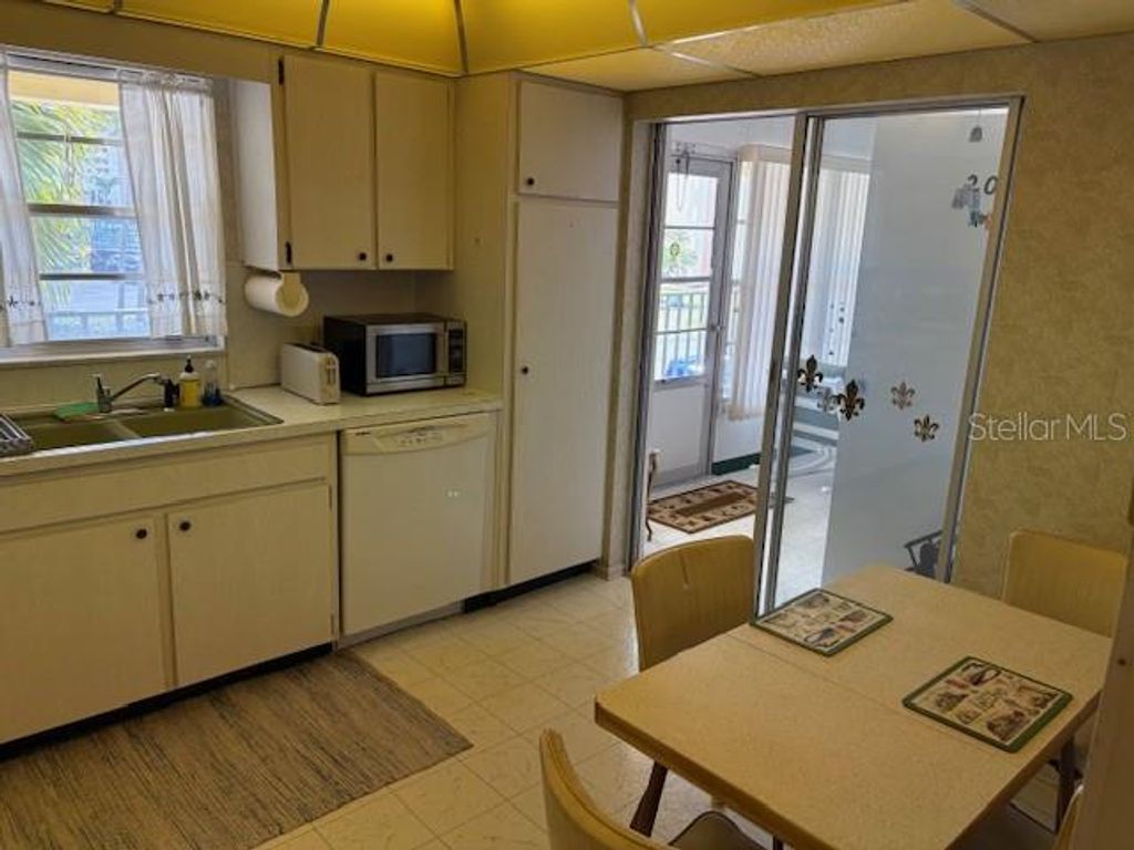 Photo of 4700 Cove Circle #203, St Petersburg, FL 33708 (MLS # TB8487707)