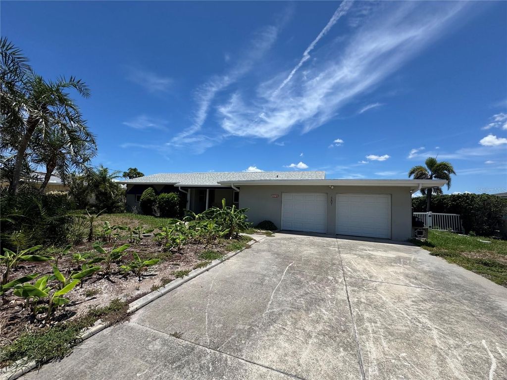 Photo of 5407 Pali Way, St Pete Beach, FL 33706 (MLS # TB8398412)