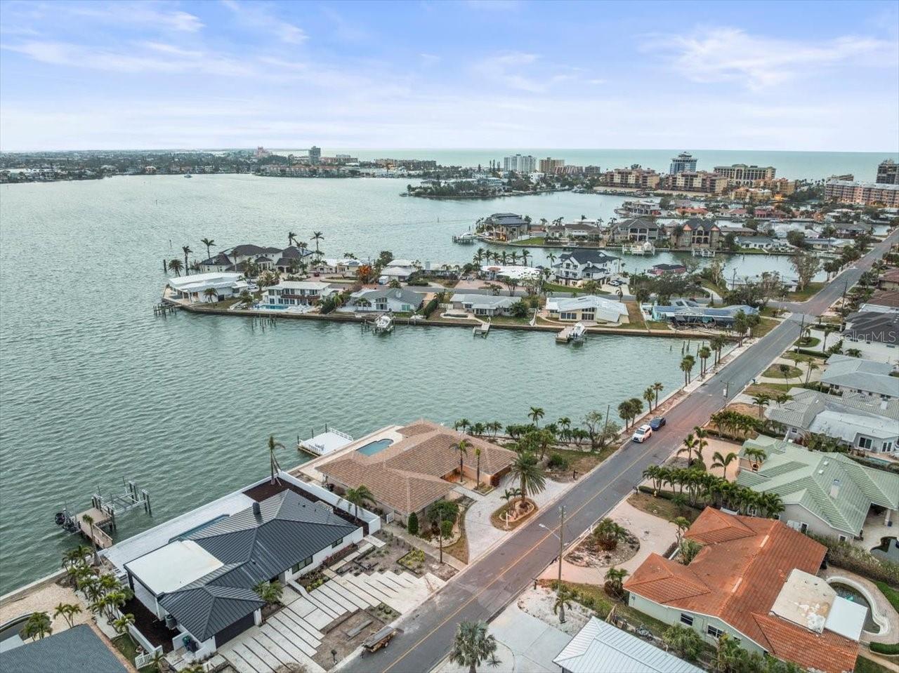 THIS IS THE #1 NEIGHBORHOOD IN ST PETE BEACH. WALK TO OVER 30 BARS & RESTAURANTS. OPEN WATER VIEWS OF BOCA CIEGA BAY. 104 X 115 FOOT LOT. THIS IS A VERY BIG LOT. THERE IS CURRENTLY A HOME ON THE LOT THAT IS CONSIDERED TO BE SUBSTANTIALLY DAMAGED. IF YOU HAVE AN INTEREST IN THE HOME WE CAN APEAL THE DAMAGE REPORT AND GET THE HOME CERTIFIED TO BE REMODELED. THE HOME IS A 3 BEDROOM 2.5 BATH WITH A 2 CAR GARAGE. ALMOST 1900 SQ. FT. MULTI MILLION DOLLER ESTATES LINE THIS NEIGHBORHOOD. REMODEL OR BUILD A NEW AMAZING PROPERTY. PERFECT FOR INVESTORS OR HOME OWNERS. YOUR DREAM CAN BECOME YOUR REALITY.