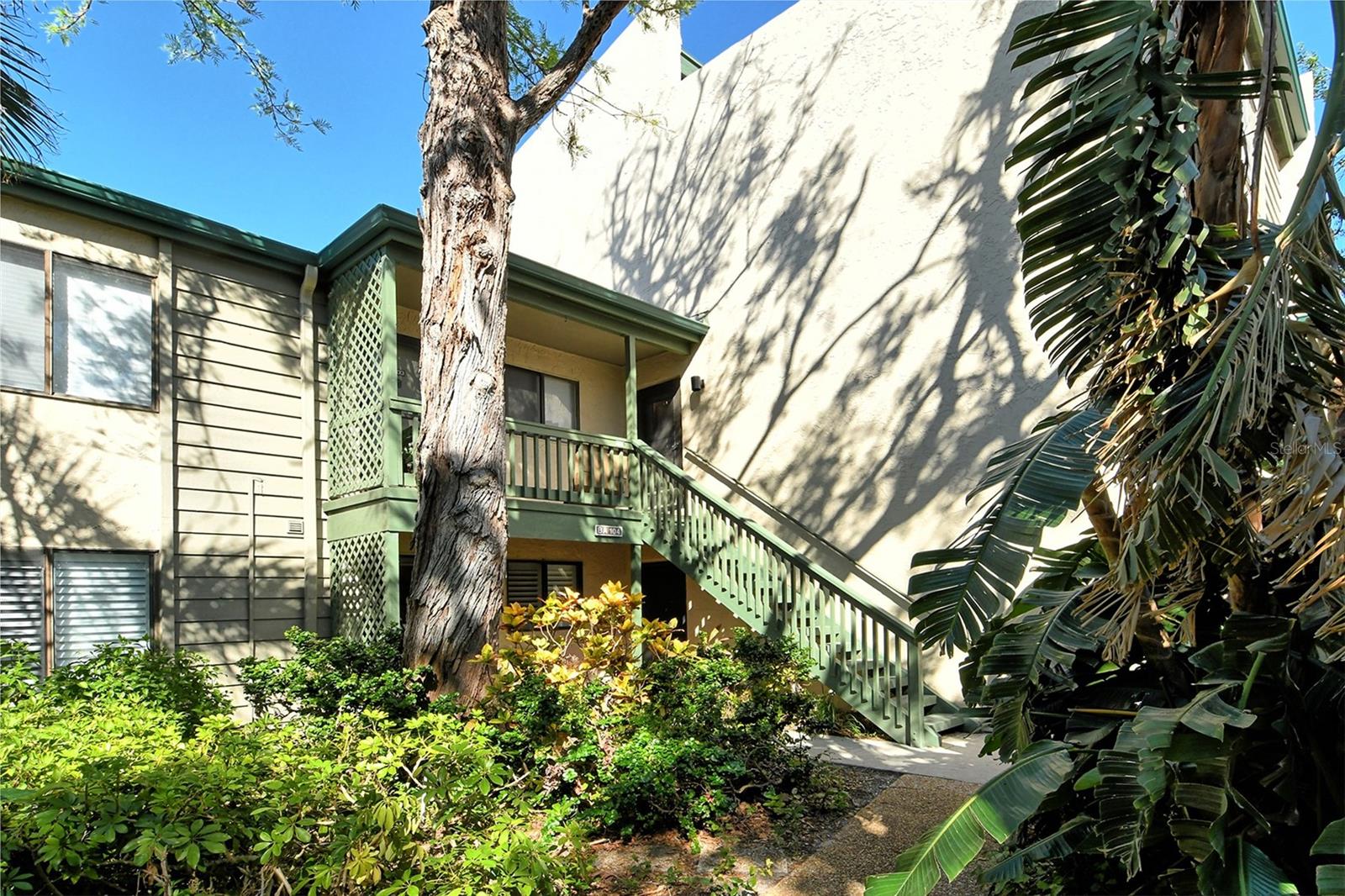 One or more photo(s) has been virtually staged. This condo is available for lease long term or short term. If you have never been to this community, you are in for a real treat. Your 2-story condominium starts on the 2nd floor. No elevators. First floor has the kitchen, full bathroom and 3rd bedroom with a walk-in closet. You have a stunning view from the lanai that has hurricane sliding doors. The 2nd floor has bedroom #2 with a walk-in closet. In addition to using this room as a bedroom, this room is perfect for an office or work out area. The master bedroom is on this level and faces the bay. This bedroom is oversized with Clerestory windows and an open patio so that you can sit in the sun or slide under the partial roof that overhangs. The best part is the view --it's phenomenal!! You can see parts of Siesta Key and the intracoastal. There are only a handful of this floor plan out of 731 units in Pelican Cove. Pelican Cove is a gated pet friendly condominium community abounding with amenities, including a low-cost 86-slip boat harbor, kayak and canoe launch, six heated swimming pools, hot-tub, three clubhouses, classrooms, gym, art, woodworking and pottery studios, four lit tennis/pickleball courts, shuffleboard, basketball, dog play area, walking trails, boardwalks and fishing gazebos. Take classes at Pelican Cove University, yoga, tai-chi, water aerobics, painting or photography. More than 37 clubs for arts, cycling, culinary arts, bridge, film and more. Relax at the evening jazz & classical music concerts, enjoy a stroll around 78 acres of lush grounds. Pelican Cove is hidden away yet minutes from everything! Come see for yourself! This is the lifestyle you deserve!