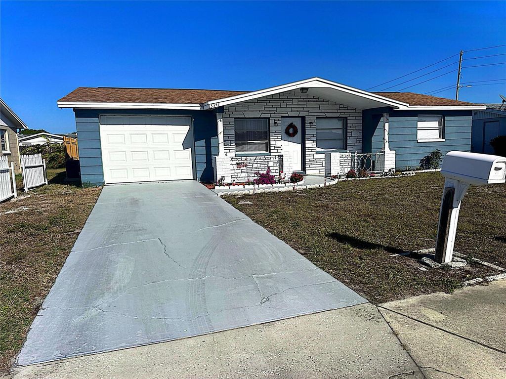 Photo of 3347 Roxbury Drive, Holiday, FL 34691 (MLS # TB8457136)