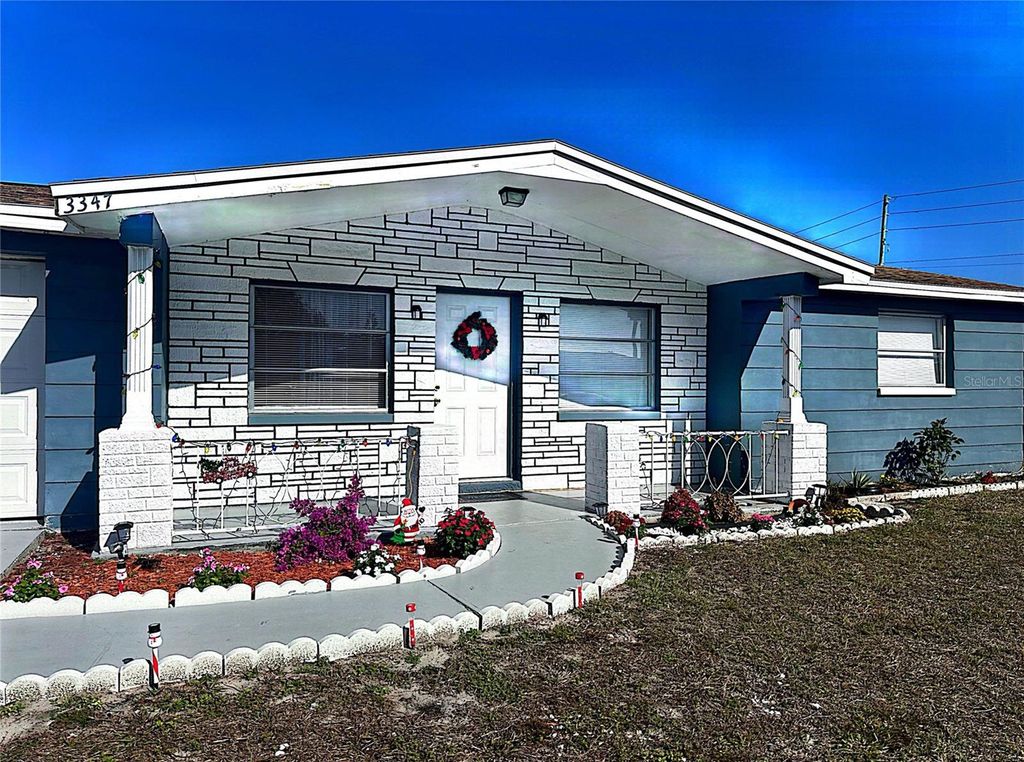 Photo of 3347 Roxbury Drive, Holiday, FL 34691 (MLS # TB8457136)