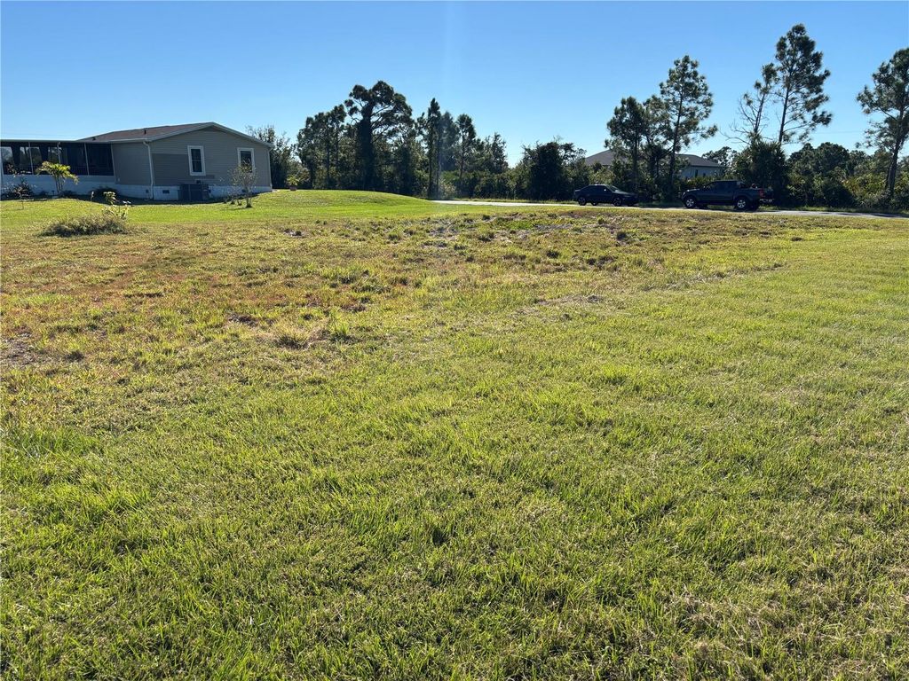 Photo of 12162 Van Loon Avenue, Port Charlotte, FL 33981 (MLS # C7517403)