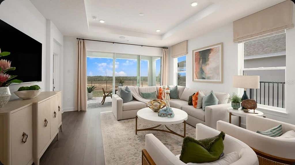 Photo of 11202 Silver Trumpet Loop, Winter Garden, FL 34787 (MLS # O6436496)