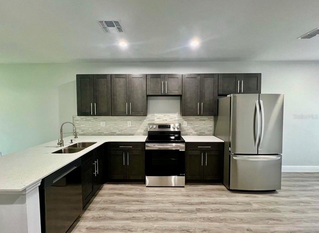 Photo of 519 Blackbird Lane #A &amp; B, Kissimmee, FL 34759 (MLS # R4911738)