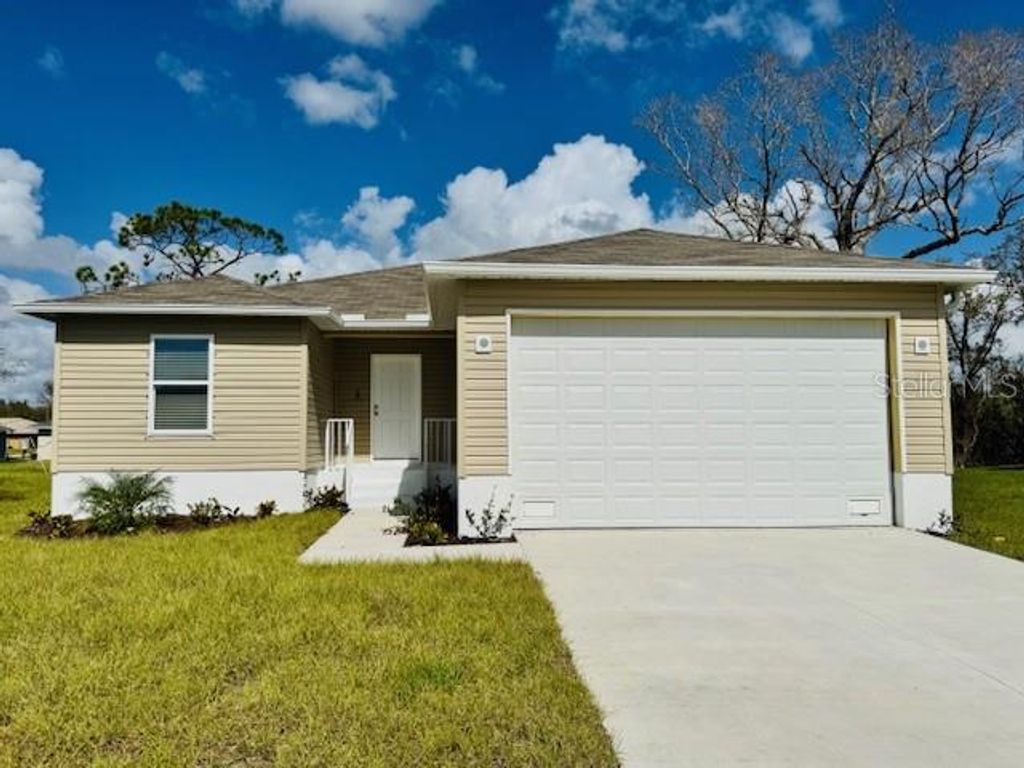 Photo of 17384 Robinson Avenue, Port Charlotte, FL 33948 (MLS # O6231302)