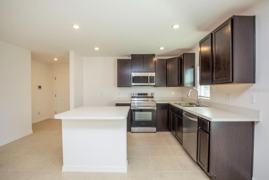 Photo of 17384 Robinson Avenue, Port Charlotte, FL 33948 (MLS # O6231302)