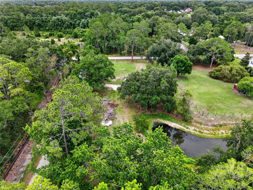 Discover the perfect opportunity to build your dream home on this beautiful 1-acre homesite in (North) Lakeland, Florida! Nestled in a peaceful country setting, this property features a pond, offering tranquil water views, relaxing mornings, and the perfect backdrop for your future home.

This Lakeland vacant land property is already equipped with electric access, a private well, and an existing septic system - helping simplify the building process, a permit is already in place for removal of the current septic system and installation of a brand-new system. Impact fees are reduced due to a previous mobile home on the property, creating valuable savings for the future owner.

With no HOA restrictions, you have the flexibility to design and build the home that fits your lifestyle. Bring your custom home plans, workshop, boats, RVs, or outdoor toys and enjoy true Florida country living with room to spread out.

Conveniently located near US-98, this property offers easy access to Lakeland, shopping, dining, schools, and major roadways while still maintaining a private, rural atmosphere. Whether you are looking for vacant land in Lakeland to build now or invest for the future, this property is full of potential.