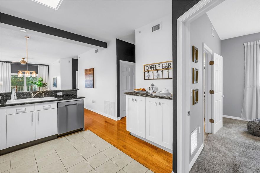 Discover the perfect blend of location, lifestyle, and peace of mind in this updated end-unit condo in the heart of downtown St. Petersburg. Located in a well-managed, pet-friendly 32-unit building just blocks from major hospitals, dining, waterfront parks, and cultural attractions, this residence offers elevated living—literally—on a 75-foot elevation site with no power loss during the 2024 hurricane season. Inside, enjoy engineered hardwood floors in the living and dining areas, tile in wet spaces, and plush carpet in the bedrooms. The open, split-bedroom floor plan features volume ceilings, fresh interior paint, hurricane-impact windows, and a private back balcony for your own slice of outdoor serenity. The kitchen shines with granite countertops, a coffee bar, and eat-in dining space. Both bathrooms are updated, with a new shower pan in the primary suite. Washer and dryer are located in the spacious in-unit laundry room. Additional perks include blinds throughout, ceiling fans, an assigned parking space, and a healthy HOA that covers cable and internet. Pet lovers welcome—bring up to 2 pets (dogs up to 50 lbs each). Move-in ready and perfectly positioned for walkable access to downtown’s best. A rare opportunity to enjoy modern finishes and secure comfort in one of St. Pete’s most desirable locations.