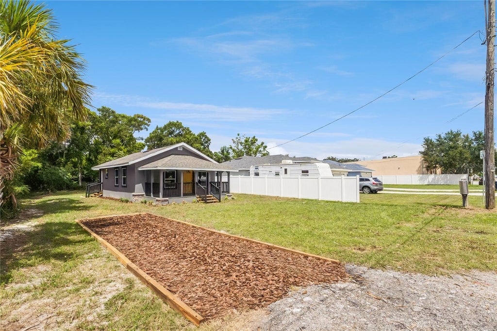 Photo of 512 Bennett Street, Auburndale, FL 33823 (MLS # O6437130)