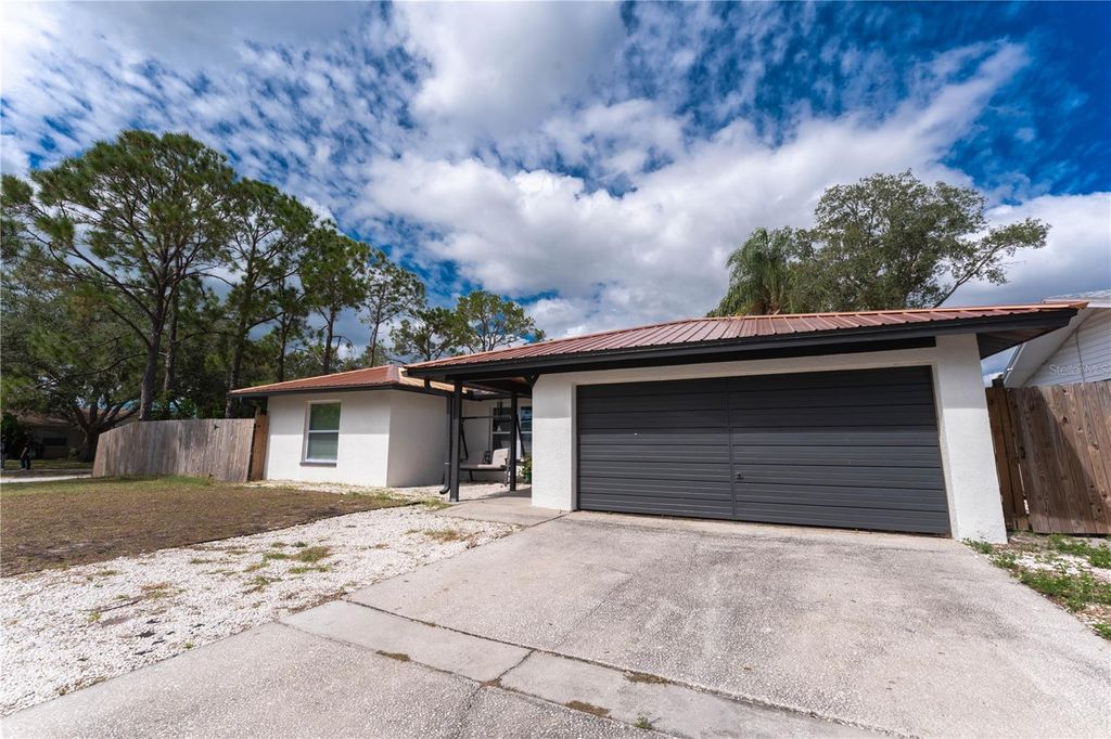 Photo of 12931 82nd Avenue, Seminole, FL 33776 (MLS # TB8471336)