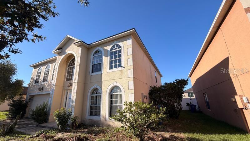 Photo of 325 Thomasdale Ave, Haines City, FL 33844 (MLS # P4940201)