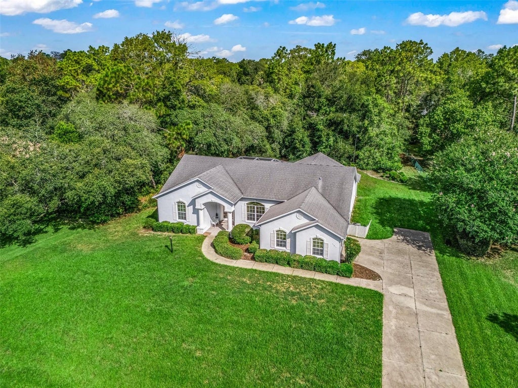 Photo of 11011 SW 53rd Circle, Ocala, FL 34476 (MLS # OM730967)
