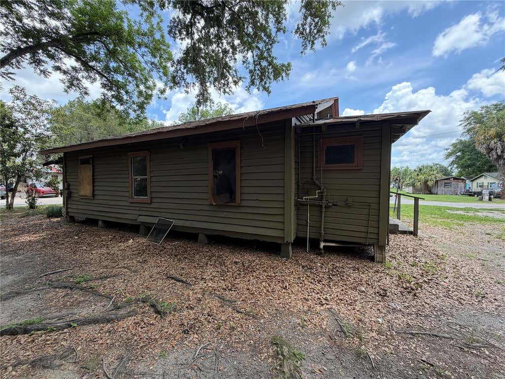 Photo of 727 NW 7th Avenue, Ocala, FL 34475 (MLS # TB8534157)
