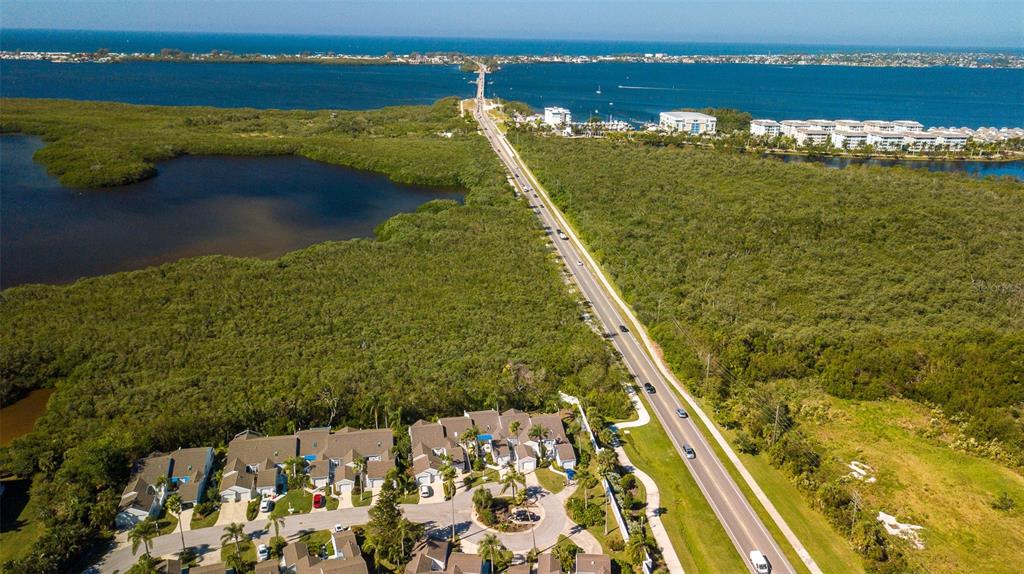 Welcome to Don't Worry Beach Happy! This magnificent 2-bedroom, 2-bath condo is located at the end of a cul-de-sac and is in the beautiful subdivision of Spoonbill Courtyard. It is located 5 minutes away from Anna Maria Island. This is the place to be! Located in Perico Bay, this unit is ideally located in West Bradenton near Robinson's Preserve, The Palma Sola Causeway Park, shopping, and plenty of entertainment. This gorgeous community features lakefront views, a pool, a fitness center, walking and bike paths, tennis courts, and a clubhouse. Upon entering the condo complex, you will find yourself surrounded by the splendors of nature. The unit has a private entrance with a separate garage and a large driveway. You will find a light and bright atmosphere. Stunning wood floors run throughout. The chef's kitchen has all you need and more! There are gorgeous countertops and plenty of cabinet space, perfect for preparing your family's favorite treats. There is a breakfast bar with four barstools adjacent to the main living space. The dining table has a lovely chandelier and can seat four. The spacious living room has two plush couches with a recliner chair. The sizeable primary bedroom has a king-size bed, a TV, a spacious walk-in closet, and an attached bath with a large vanity and a walk-in shower. The second bedroom has a queen-size bed, a bench, closet space, and an attached bathroom with a shower/tub combo. There is a fantastic Florida room with unobstructed views of the backyard. Through the French doors, you will find outdoor seating for two. There is a spacious backyard perfect for family gatherings. Come and see why people return to Spoonbill Courtyard year after year. Washer and Dryer on-premise. House Rule: No smoking. No burning candles inside of lodging. No parties. Furry friends welcome, max 2, and require a $200 per pet non-refundable pet fee to be paid directly to the management company.
**Taxes and fees not included.