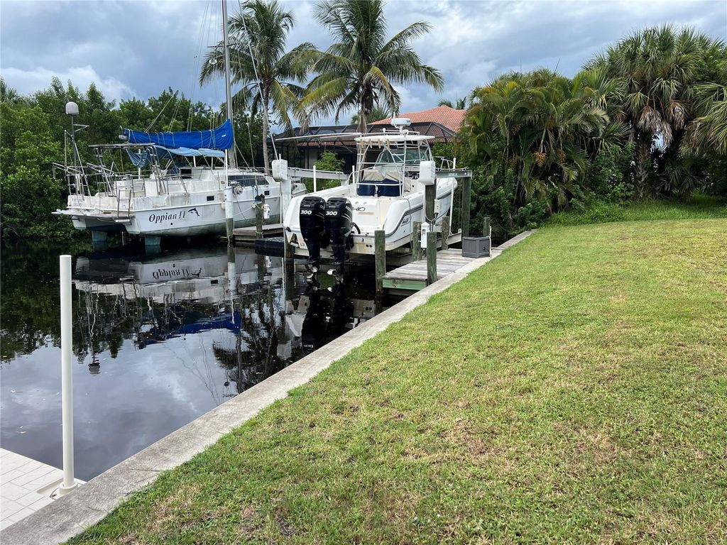 Photo of 18506 Ayrshire Circle, Port Charlotte, FL 33948 (MLS # A4661484)