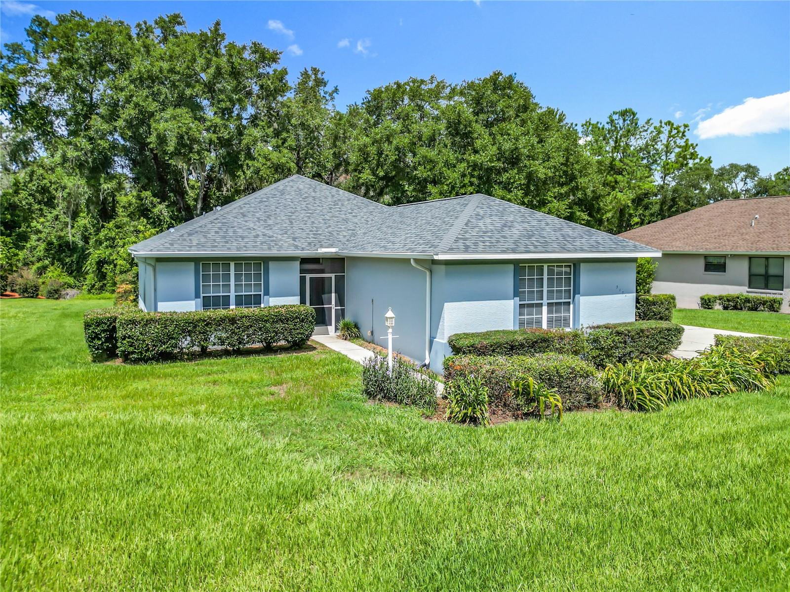 Some photos have been virtually staged. Welcome to your private retreat in peaceful Hernando! Nestled on nearly half an acre (0.4957) in the desirable Canterbury Lake Estates, this inviting 2-bedroom, 2-bathroom home offers 1,479 sq ft of comfortable, well-designed living space. Step inside to a light-filled, open layout that’s perfect for both everyday living and entertaining. The spacious living area flows seamlessly into the kitchen and dining spaces,
creating a warm, welcoming atmosphere. Two generously sized bedrooms, including a private owner’s suite, provide the perfect place to unwind. Out back, your nearly half-acre lot offers endless possibilities—add a pool, create lush gardens, or simply enjoy the extra space and privacy. Living in Canterbury Lake Estates means you’re just moments from world-class golf, clubhouse amenities, tennis, and scenic walking trails—all set within a beautifully maintained community that feels like a year-round vacation. Located just minutes from shopping, dining, and outdoor recreation, this property offers the perfect balance of tranquility and accessibility. Whether you’re looking for your
first home, a seasonal getaway, or a place to downsize without compromising, this one is a must-see. Schedule your private showing today—your Florida lifestyle awaits!