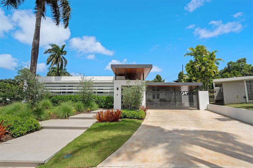 “THE BEST OPPORTUNITY IN TORRIMAR - RECENTLY REMODELED – LARGE LOT – LOCATION” READY TO MOVE IN!!
Welcome to your dream retreat located in the gated community of TORRIMAR, Alhambra Street, GUAYNABO, Puerto Rico! Step into luxury living with our meticulously renovated resort-style home, where every detail has been carefully crafted for ultimate 
comfort and sophistication.

The house has an area of 3,726 square feet and sits in a 1,264 square meter lot. Open floor plan, 4 bedrooms, office, guest room, family, 4 bathrooms, powder room, and laundry. Gourmet kitchen with top-of-the-line appliances; Wolf microwave & double oven, Cove dishwasher, Subzero refrigerator/freezer, and LG washer/dryer. The back yard includes spacious terrace, outdoor kitchen/bar, powder room, outdoor shower, open-covered terrace, pool, barrel 6-person pine sauna, cold plunge tub, pool, soothing spectacular landscaping. The home also includes Lutron lighting control system, Sono’s sound system, CCTV server storage with 13 cameras, full diesel power generator, solar water heater and water cistern. Gated carport with a 2-car capacity and driveway area for 2 additional cars. TAXES-$4,932/year, HOA-$140/month.

Nestled in a serene setting, this TURN-KEY property invites you to indulge in the epitome of relaxation and convenience. From the moment you walk through the door, you'll be greeted by a seamless blend of modern elegance and timeless charm.
With recent renovations sparing no expense, this home boasts state-of-the-art amenities and stylish finishes throughout. Whether you're unwinding in the lavish master suite, entertaining guests in the spacious living areas, or soaking up the sun in the lush outdoor oasis, every inch of this home exudes luxury and tranquility. 

Torrimar Development Amenities -Gated community, 24/7 security, activity center, playground. Conveniently located in close proximity to private schools, fine dining, shopping centers and many other places of interest.

Don't miss your chance to experience resort-style living every day. Your perfect getaway awaits – schedule a viewing today and make this stunning retreat your own!

Will go fast, Just call today!