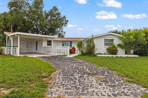 Photo of 138 Dowling Avenue NE, Port Charlotte, FL 33952 (MLS # TB8416575)