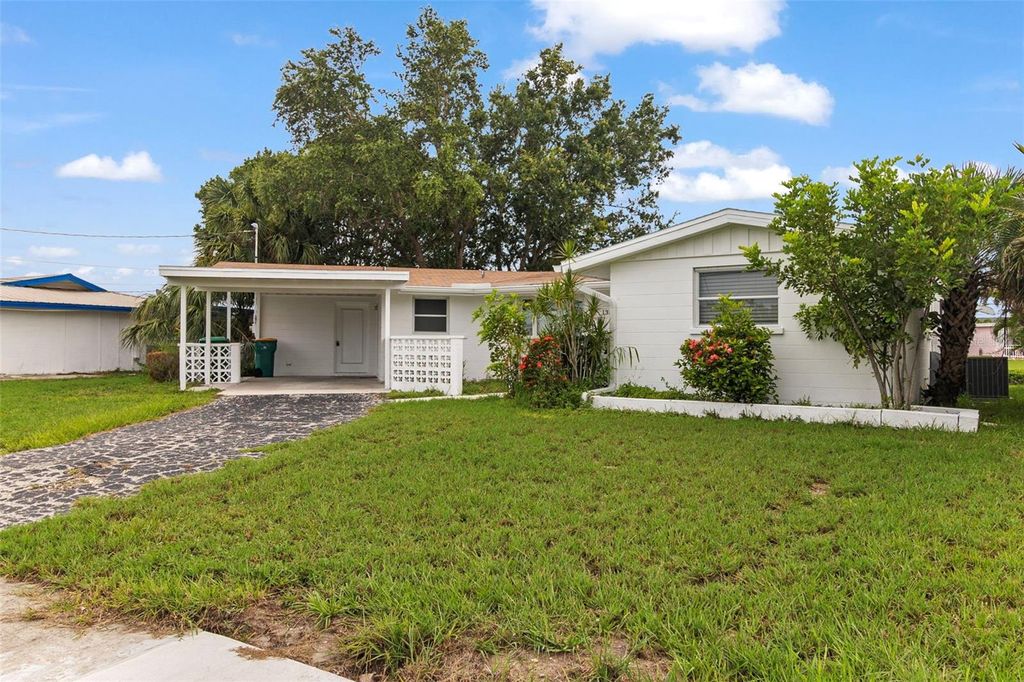 Photo of 138 Dowling Avenue NE, Port Charlotte, FL 33952 (MLS # TB8416575)
