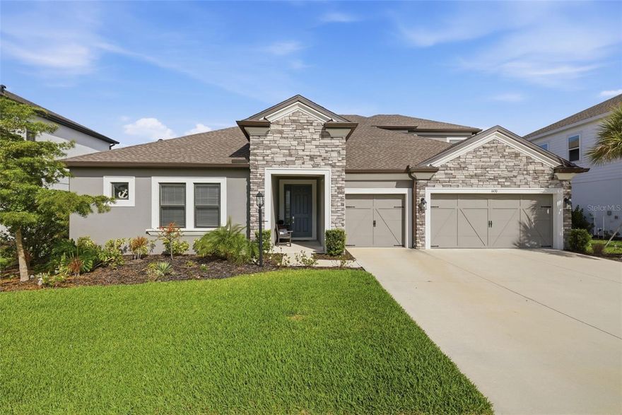 Welcome to this beautifully designed 5-bedroom, 4.5-bath home located in the highly desirable Park East at Azario in Lakewood Ranch. Offering a thoughtful layout and serene pond views with no rear neighbors, this home perfectly blends comfort, privacy, and everyday functionality. The open-concept design seamlessly connects the kitchen, main living area, and a flexible dining space just off to the side—ideal for both everyday living and entertaining. Natural light fills the home, while sliding glass doors lead to a screened-in lanai and fenced backyard, creating a true indoor-outdoor lifestyle. One of the standout features of this home is its highly functional layout, with the majority of the bedrooms conveniently located on the main level. Upstairs, you’ll find a private bedroom, full bathroom, and a spacious loft—perfect for guests, a media room, or additional living space. Step outside to enjoy peaceful pond views with no neighbors directly behind, offering both privacy and a relaxing backdrop. Residents of Park East at Azario enjoy an active, amenity-rich lifestyle with a community pool, sand volleyball and basketball courts, an open soccer field, playground, and dog park. This home is zoned for the newly opened Lake Manatee K-8 School. Ideally positioned within Lakewood Ranch, you’re just minutes from golf, shopping, dining, and everyday conveniences, with easy access to I-75 for a quick drive to Waterside, University Town Center, and the Gulf Coast’s stunning beaches. Lakewood Ranch continues to be one of the most sought-after master-planned communities in the country, known for its vibrant lifestyle and ongoing growth. With exciting new amenities on the horizon at Premier Park, including an expansive aquatic center and 24 pickleball courts, the lifestyle here continues to evolve.