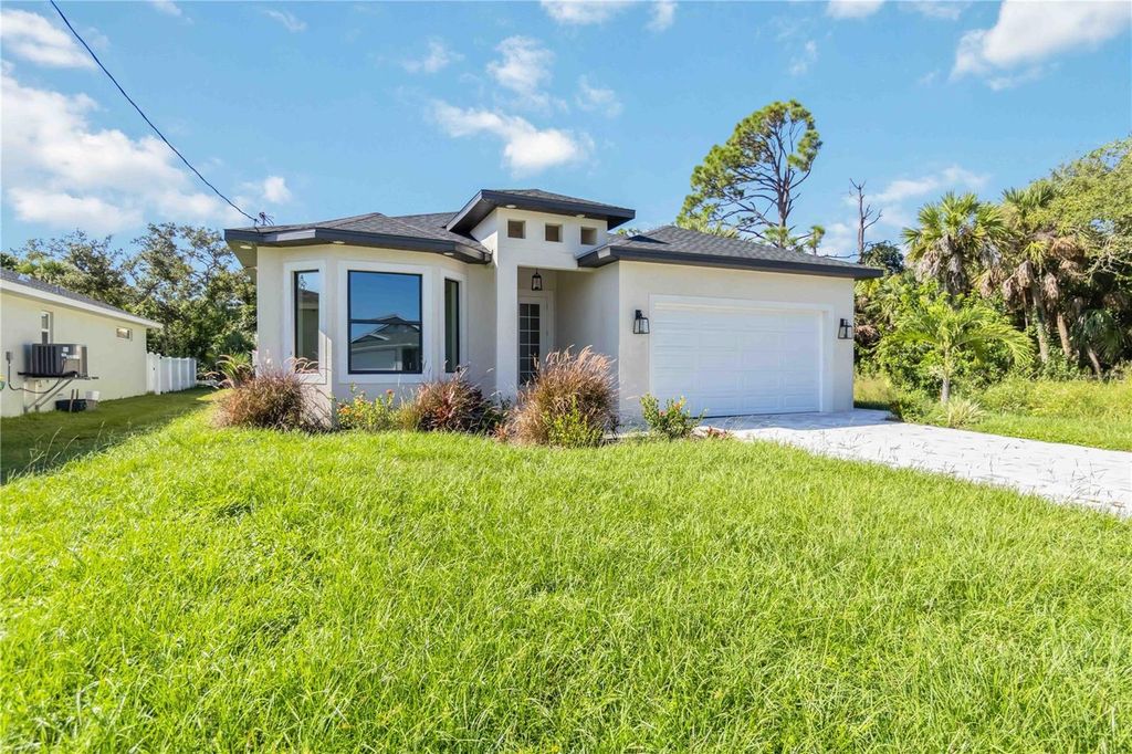 Photo of 205 Cougar Way, Rotonda West, FL 33947 (MLS # N6140551)