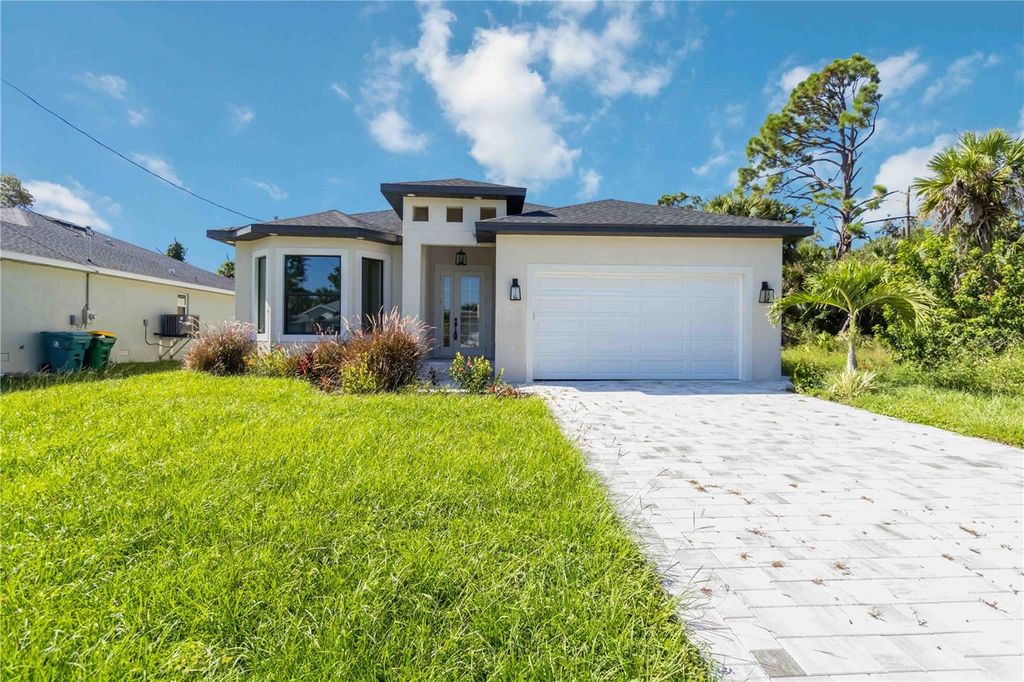 Photo of 205 Cougar Way, Rotonda West, FL 33947 (MLS # N6140551)