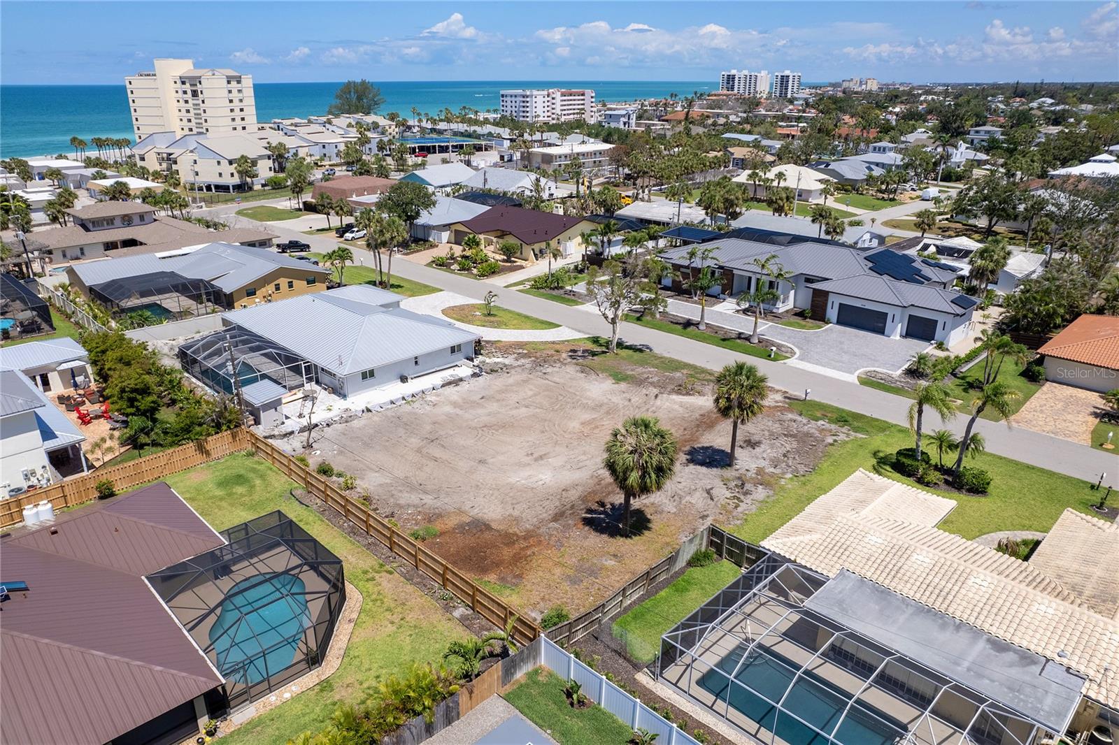 Rarely available vacant lot ready to build in Golden Beach section on historic Venice Island. Only three houses away from beach access and the fabulous Venice Beach and azure, blue Gulf waters. Ideal for the discriminating buyer to build a new luxury home with finest amenities and Florida lifestyle. The community has an optional low-fee homeowner association for social activities and beach access. However, the beautiful downtown Venice Avenue boasts of excellent boutique shops and many fine dining restaurants and cultural art and music events, and local community theater. The Venice Mainstreet organization sponsors unique events throughout the year. The City of Venice was designed by the internationally known urban planner John Noland with many parks, recreational paths and beaches. Biking and golf carts are extremely popular to explore the beauty of Venice. The community also has the Venetian Waterway Trail along the Intracoastal Waterway and connects with the Legacy Trail to Sarasota for approximately 30 miles to enjoy or bike. The city-owned lighted tennis/basketball courts are just a short distance away as part of a healthy lifestyle without fees and free parking. Venice is certainly part of the cultural hub of Southwest Florida. A new lot survey is available for your contractor to design your beautiful new home in Golden Beach. Let's start the process!