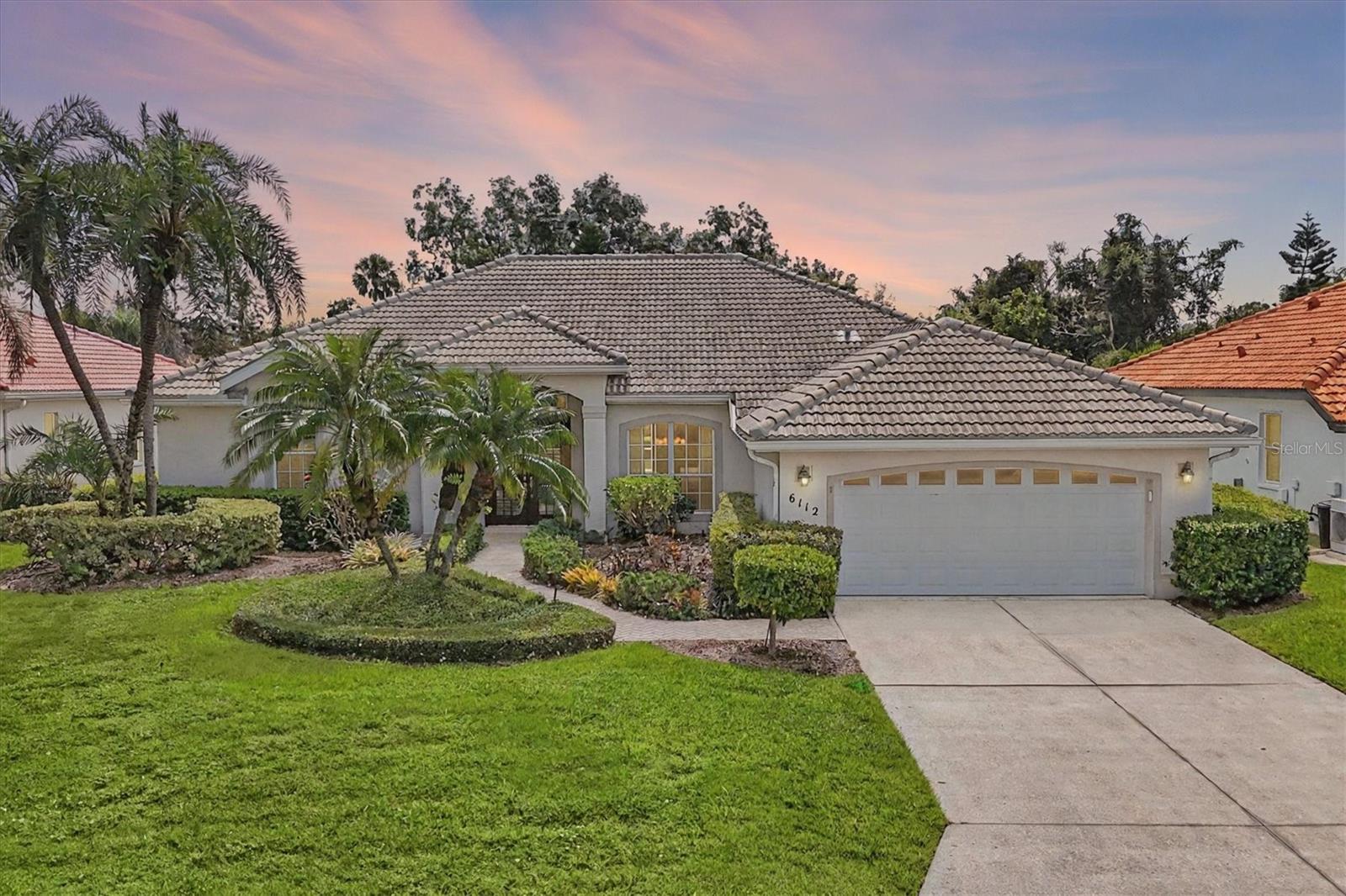 Refined Sarasota Living.
This recently refreshed residence blends style, comfort, and privacy, backing onto a tranquil nature preserve for a true indoor outdoor sanctuary.
The open floor plan is highlighted by soaring vaulted ceilings, crown molding, and expansive sliding glass doors that flood the home with natural light and frame views of the lush greenery beyond. Formal living and dining areas flow effortlessly together, perfect for intimate evenings or entertaining.
At the heart of the home, the kitchen with its own dining nook opens to the main living spaces and overlooks the screen-enclosed pool and patio. The private primary suite offers serene preserve views, while two additional bedrooms?including a versatile office/bedroom comfortably accommodate family or guests.
Peace of mind comes with thoughtful updates: tile roof (2020), A/C (2020), appliances (2020), and pool screen (2019).
Residents of Mote Ranch enjoy a wealth of amenities, community pool, clubhouse, riverfront dock, and scenic walking trails, all with low HOA fees and no CDD, and just minutes from University Town Center, championship golf, downtown Sarasota/Waterside, Lakewood Ranch and the Gulf beaches.