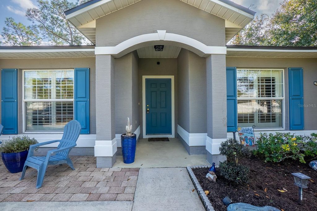 Photo of 103 Boulder Rock Drive, Palm Coast, FL 32137 (MLS # FC314154)