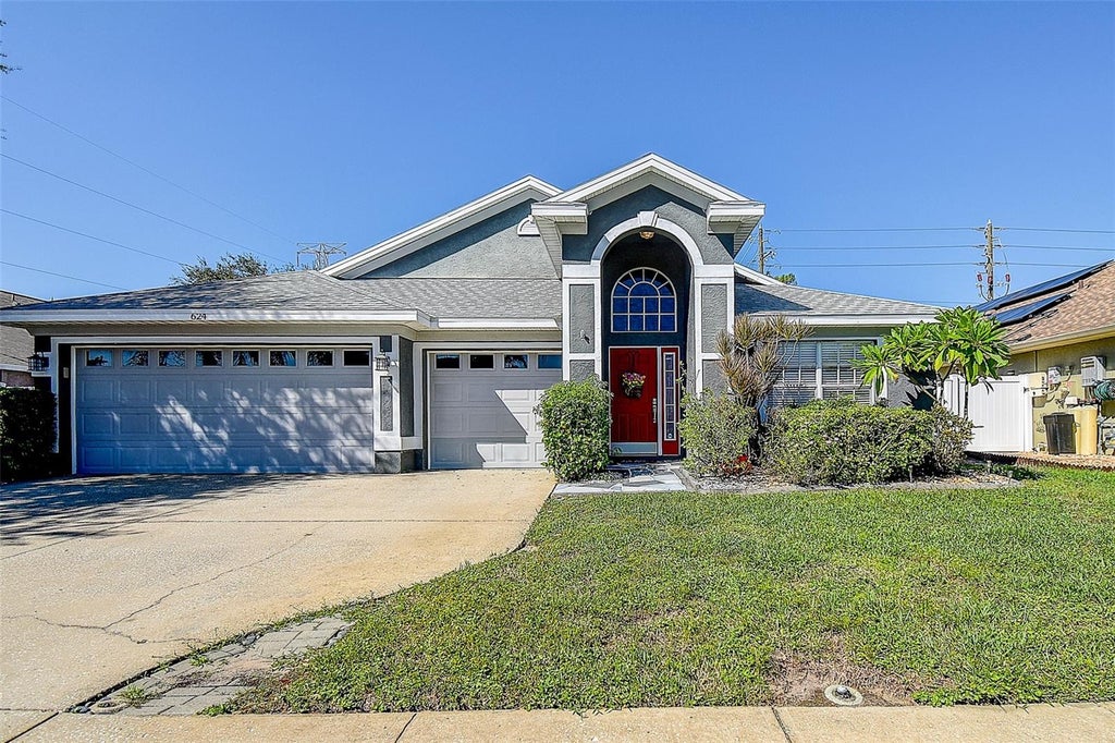 Photo of 624 N Lake Boulevard, Tarpon Springs, FL 34689 (MLS # W7890346)