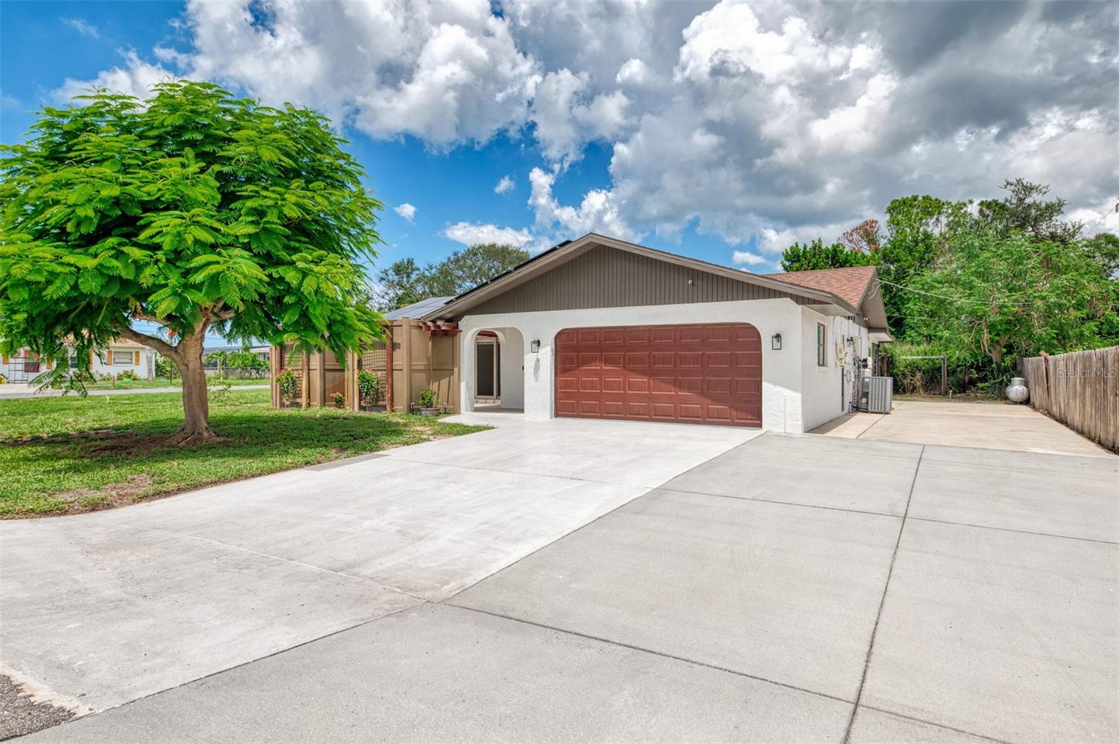 One or more photo(s) has been virtually staged. WOW, Bring your BOAT, Camper/RV! This home is 1 block from the South Venice Ferry and BOAT Ramp, check out the extra parking spaces that this home offers! Bring your toys! This freshly painted 2 bedroom, 2 bathroom home has been updated! Brand new carpeting, Remodeled Kitchen and Baths. PROPANE TANK FOR GAS STOVE! TANKLESS HOT WATER TANK! SOLAR PANELS 1 year! ROOF 7 years! BLOWN INSULATION! Updated Panel Box 7 years! HVAC 10 years! Home has been re-piped! 4-POINT already Done! NOT in a FLOOD ZONE, yet just walking distance to Ferry! This is a great house! Rooms are spacious, light and bright, not to mention the front patio garden enclosure is pre-plumbed and pre-wired for electric! Back enclosed sun room - lanai is freshly painted and new carpeting too! Back yard offers garden beds and He - She shed or room for your canoes with extra drive way! So much storage for all your tools! This home is a must see! Not just "an" every day home on the market for sure! Minutes to Shamrock Park and South Civic Association! Join the lifestyle that there is NO CDD! Make sure to see this showcase home! Call Today!